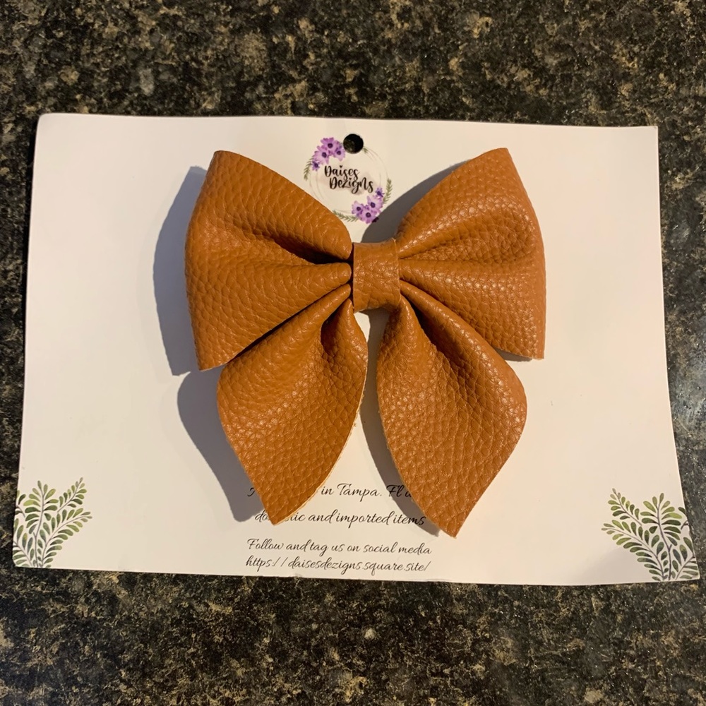 Handmade Bow Fun Kicky Tan thick leather like with long clip 4”x4”